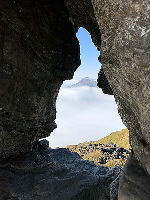 Ben Arthur - The Cobbler. Through the Cobblers needle.  Extreme caution if you choose to go on top