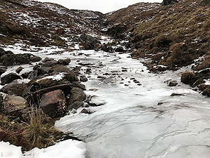 Glens Kendrum and Ogle. A well frozen ford