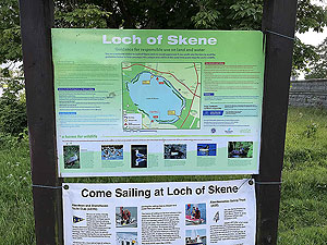 Loch Skene . Information board about the loch.