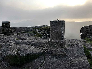 Bennachie. On the top with the trig point and info sign