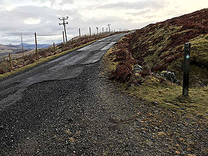 Killin - Lochan Breaclaich. Past the gate and another marker