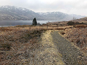 Kinlochard 5 lochs. Snow on the hills