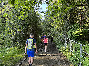 Whinny Hill : Runners head out on the start of the trail section