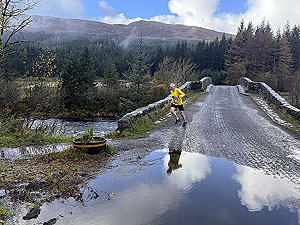 Bridge of Orchy 10k  : Runner nears the end of the race