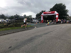 Runner approaches the finish line of the mull half marathon