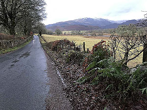 The small quiet road heading away from the village